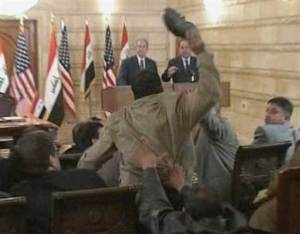 When George Bush had a shoe thrown at him by a reporter in Iraq, the two of them had conflicting views.